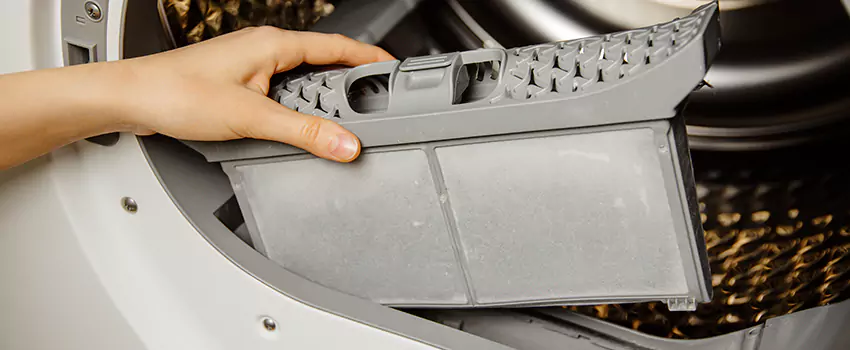 Signs Of A Clogged Dryer Lint Trap in Medford, New York